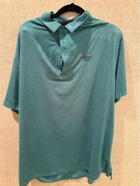 Matte Grey performance polo is a heathered turquoise blue color in a size 2XL